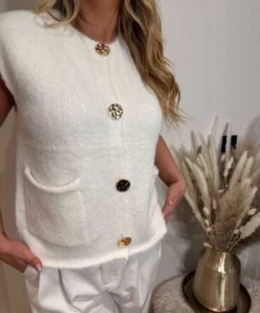 White sleeveless golden button gilet