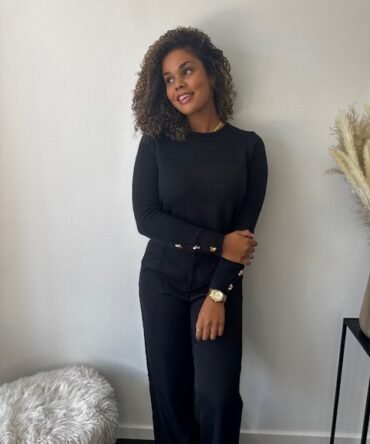 Black sweater with golden buttons