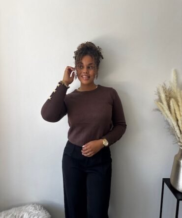 Brown sweater with golden buttons